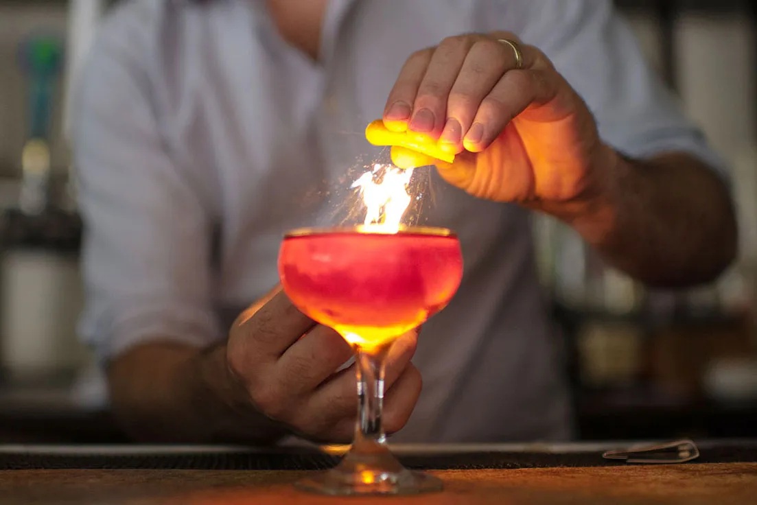 How to Flame an Orange Peel (And Why It Makes Your Cocktails Better)